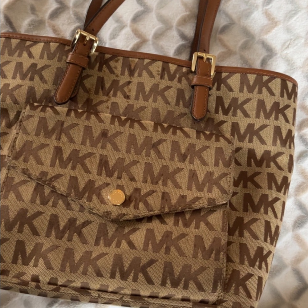 Brown Michael Kors purse.